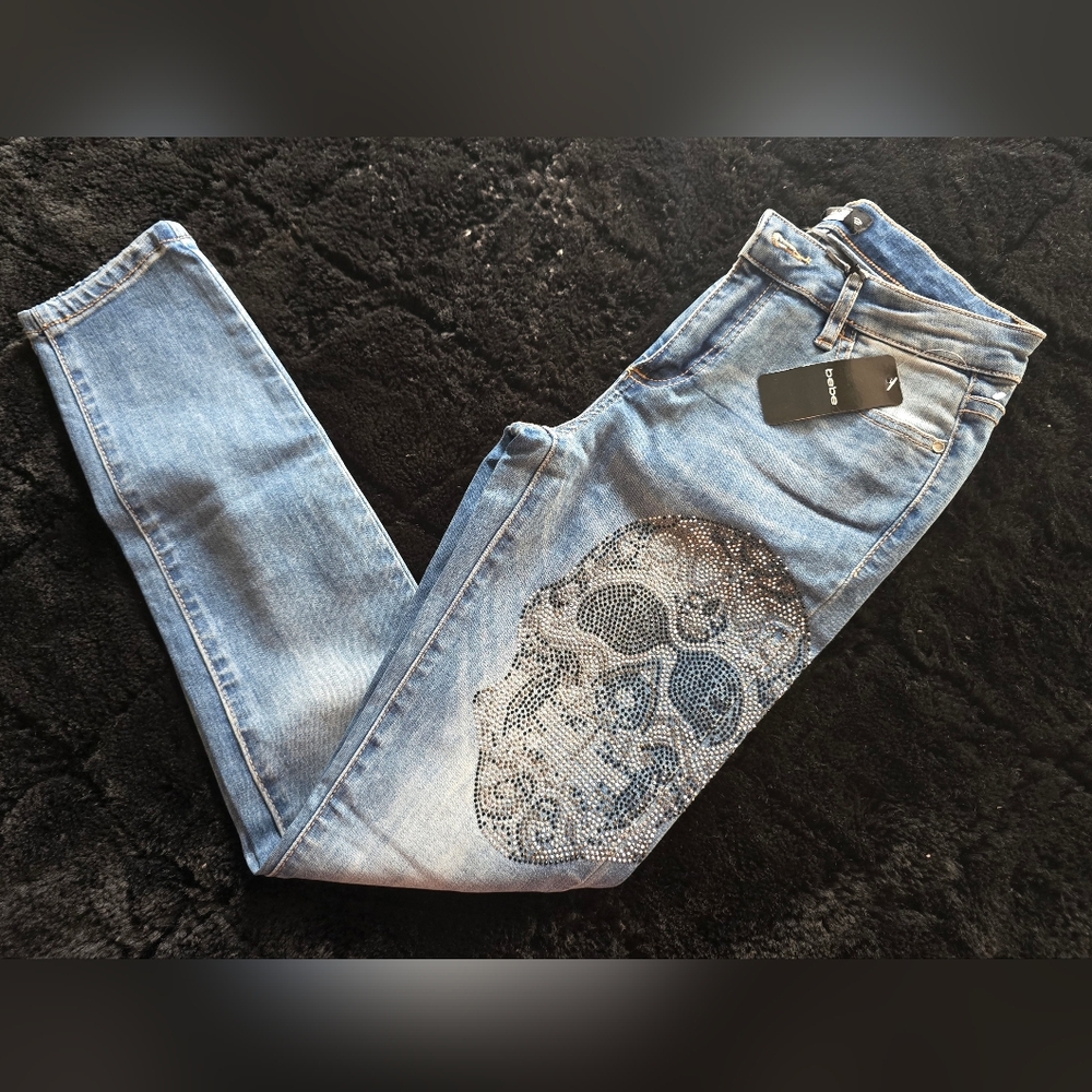 bebe Light Blue Skinny Jeans with Skull Embellishment